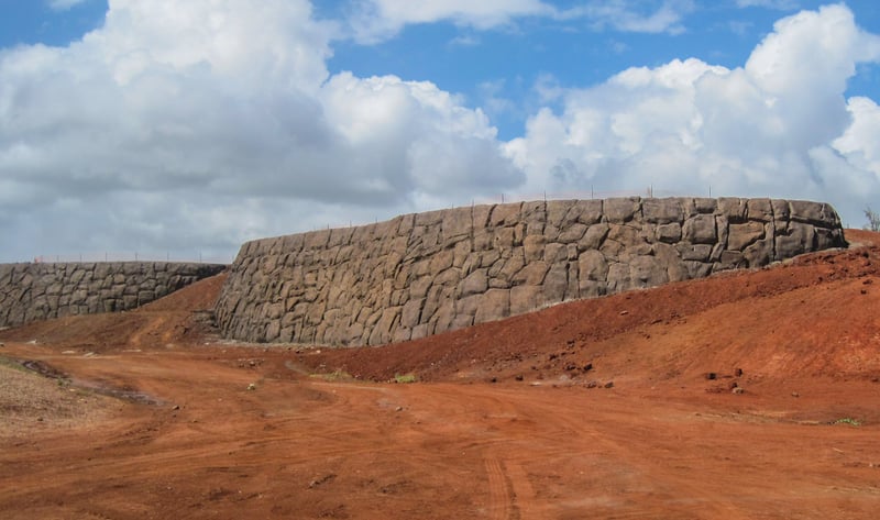 Boulderscape Sculpted Shotcrete With Hawaiian Lava Finish Used To Make Walls Safer Around Pedestrians 
