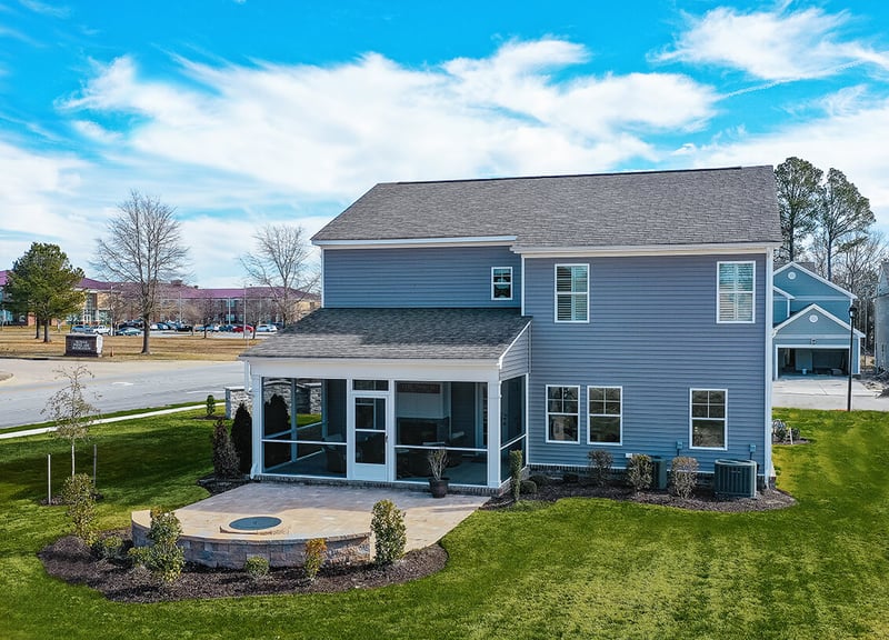 Royal® Residential D4 in Harvard Slate and Royal® Board & Batten Weathered Gray and Royal® Vinyl Trim in White