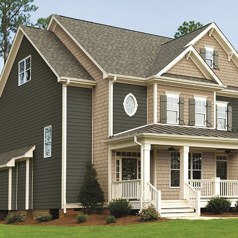 Royal® Estate™ D4 in Granite, Portsmouth™ Staggered Edge Shake in Soft Maple, and Vinyl Trim in White